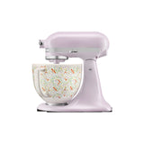 KitchenAid Artisan tilt-head stand mixer in pastel purple with wildflower patterned bowl