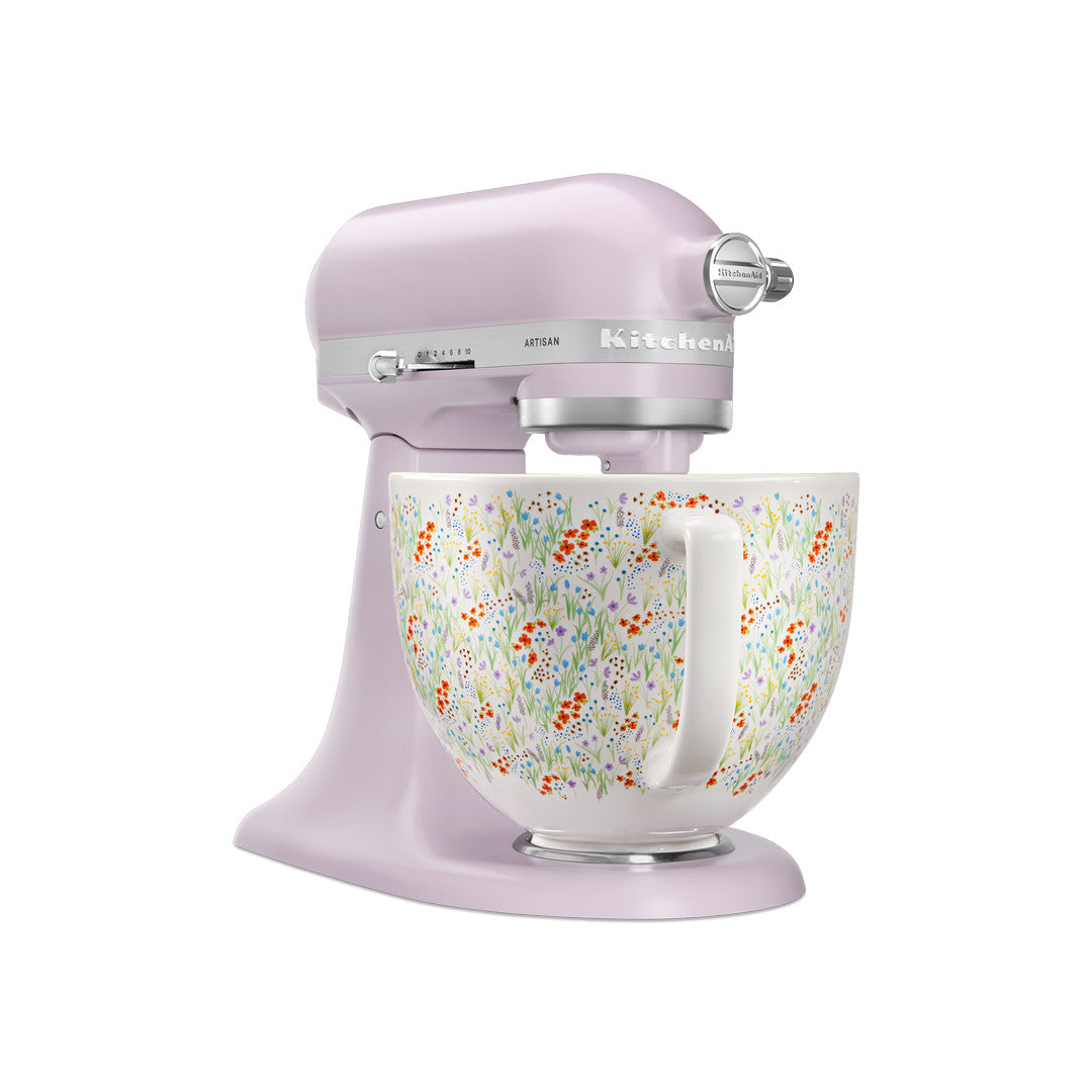 KitchenAid Artisan tilt-head stand mixer in pastel purple with wildflower patterned bowl