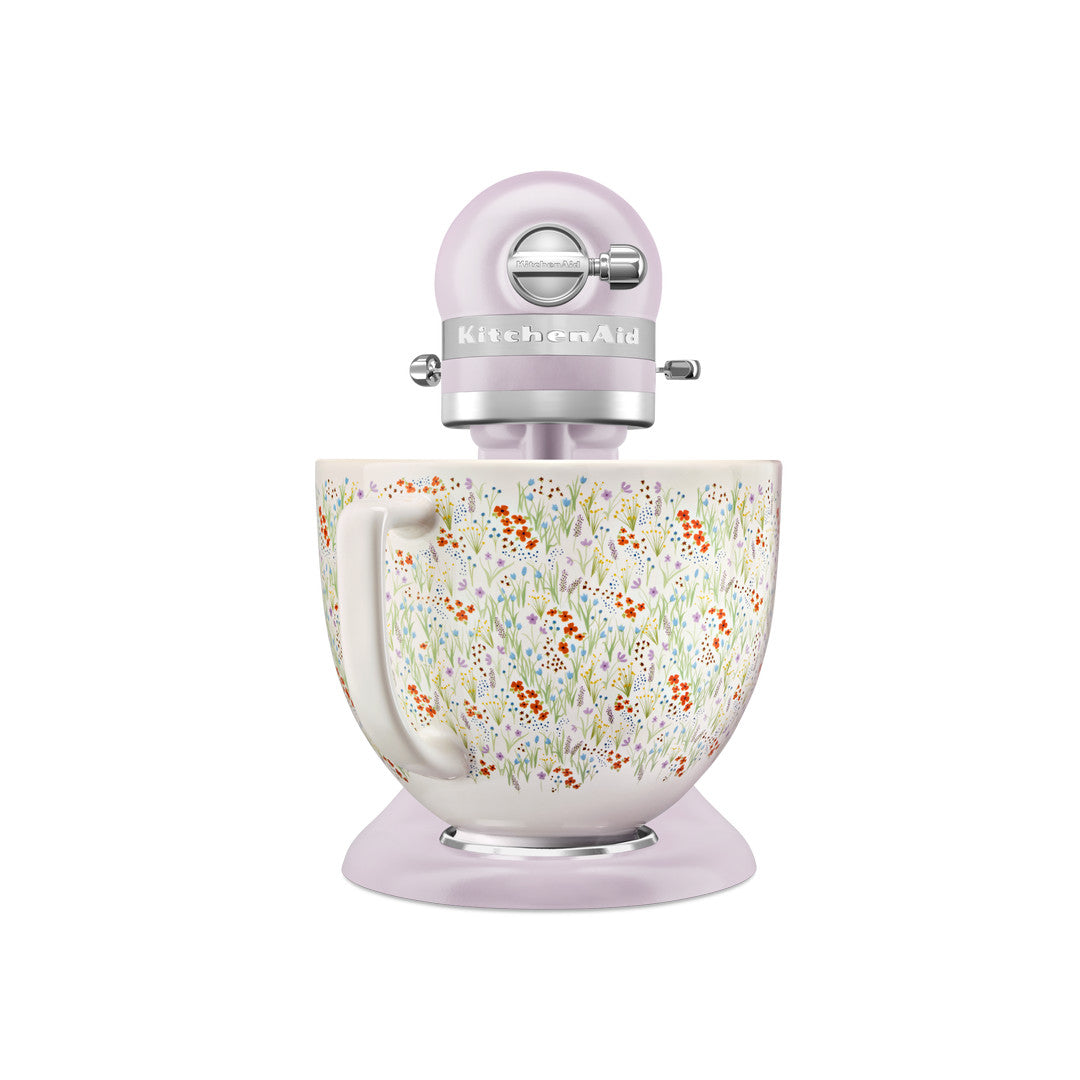 KitchenAid Artisan tilt-head stand mixer in pastel purple with wildflower patterned bowl