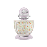 KitchenAid Artisan tilt-head stand mixer in pastel purple with wildflower patterned bowl