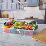 Farberware SnackleBox with Bamboo Board 30 x 40cm - filled with fresh vegetables on a kitchen counter.