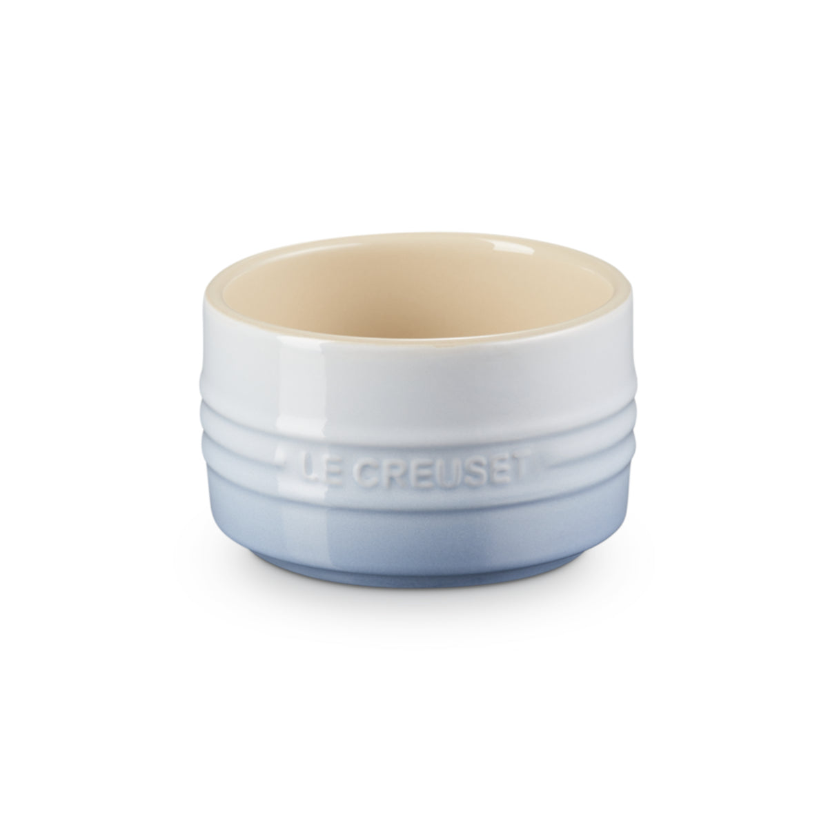 Le Creuset Ramekin 200ml Coastal Blue stoneware dish with cream interior and embossed logo, ideal for desserts and condiments