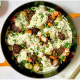 Le Creuset Signature Everyday Pan filled with baked vegetables and creamy sauce