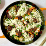 Le Creuset Signature Everyday Pan filled with baked vegetables and creamy sauce