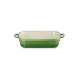 Le Creuset Signature Roaster 33cm Bamboo Green cast iron baking dish with cream enamel interior and looped handles