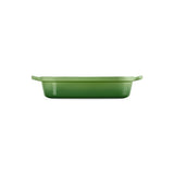 Le Creuset Signature Roaster 33cm Bamboo Green cast iron baking dish with cream enamel interior and looped handles
