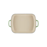 Le Creuset Signature Roaster 33cm Bamboo Green cast iron baking dish with cream enamel interior and looped handles