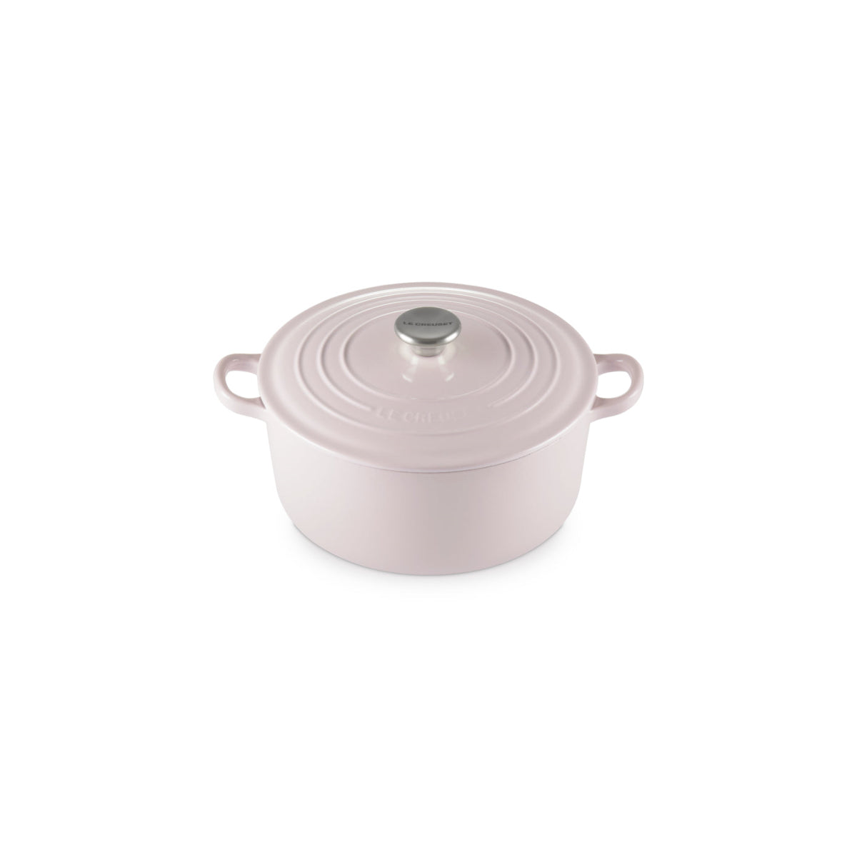 Angled view of Le Creuset Shallot round casserole with silver knob on white background.