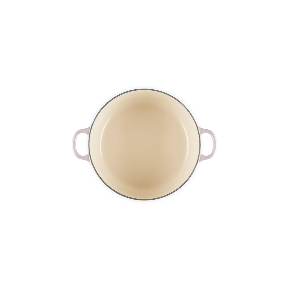 Top-down view of open Le Creuset Shallot casserole showing cream enamel interior.