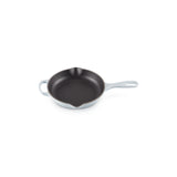 Le Creuset Signature Skillet 20cm Coastal Blue cast iron frying pan with black enamel interior and helper handle