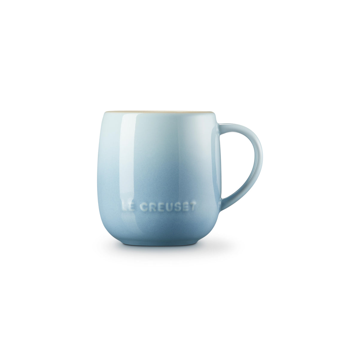 Le Creuset U Mug Coastal Blue angled view showing handle and glossy finish