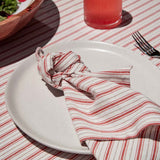 Madras Link Carol Red Stripe Tablecloth 150 x 230cm, top view of folded tablecloth with red stripe pattern