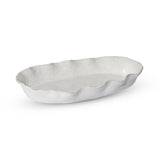 Madras Link Marseille Wavy Oval Dish Natural 39 x 21cm, angled view of natural ceramic oval dish with wavy edges on white background