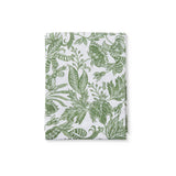 Madras Link Samara Tablecloth Green 150 x 230cm – folded green leafy patterned tablecloth on white background