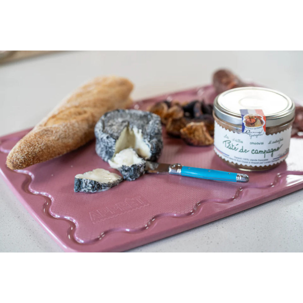 Maison Appret Chopping Board Pink 40 x 28cm with rectangular shape and handle hole