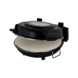 Angled view of MasterPro Ultimate Pizza Oven Black open showing ceramic pizza stone interior