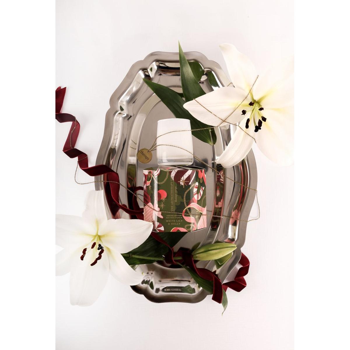 The Aromatherapy Co. White Lily & Holly Candle 80g – festive soy wax candle in white glass jar with seasonal green and red gift box