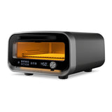 Ooni Volt 2 Pizza Oven Charcoal – front view with pizza baking inside at 450 degrees