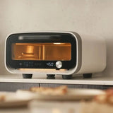 Ooni Volt 2 Pizza Oven Polar White – front view close-up with digital temperature display