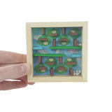 Project Genius Bird's Nest Puzzle - with a hand holding | Minimax