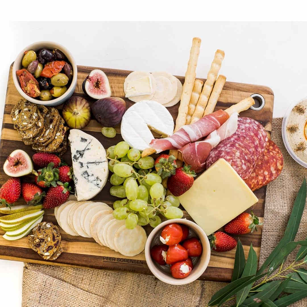 Peer Sorensen acacia wood serving board with cheese, fruit and charcuterie, large entertaining platter board