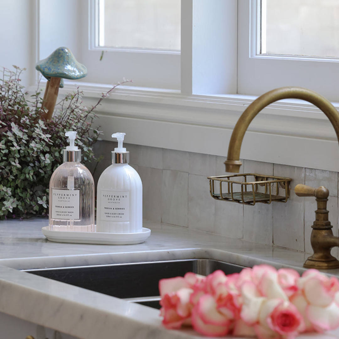 Elegant hand care duo styled by the sink for a fresh and fragrant everyday routine