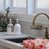Elegant hand care duo styled by the sink for a fresh and fragrant everyday routine