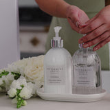 A fresh sink-side moment with the Gardenia hand care set in elegant white packaging