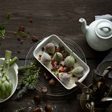 Pillivuyt Deep Rectangle Baker 2.75L – lifestyle view with figs, herbs, and spices styled on a rustic wooden table