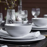 Pillivuyt Plissé Salad Bowl 15cm – styled on a dining table setting with matching dinnerware and glassware