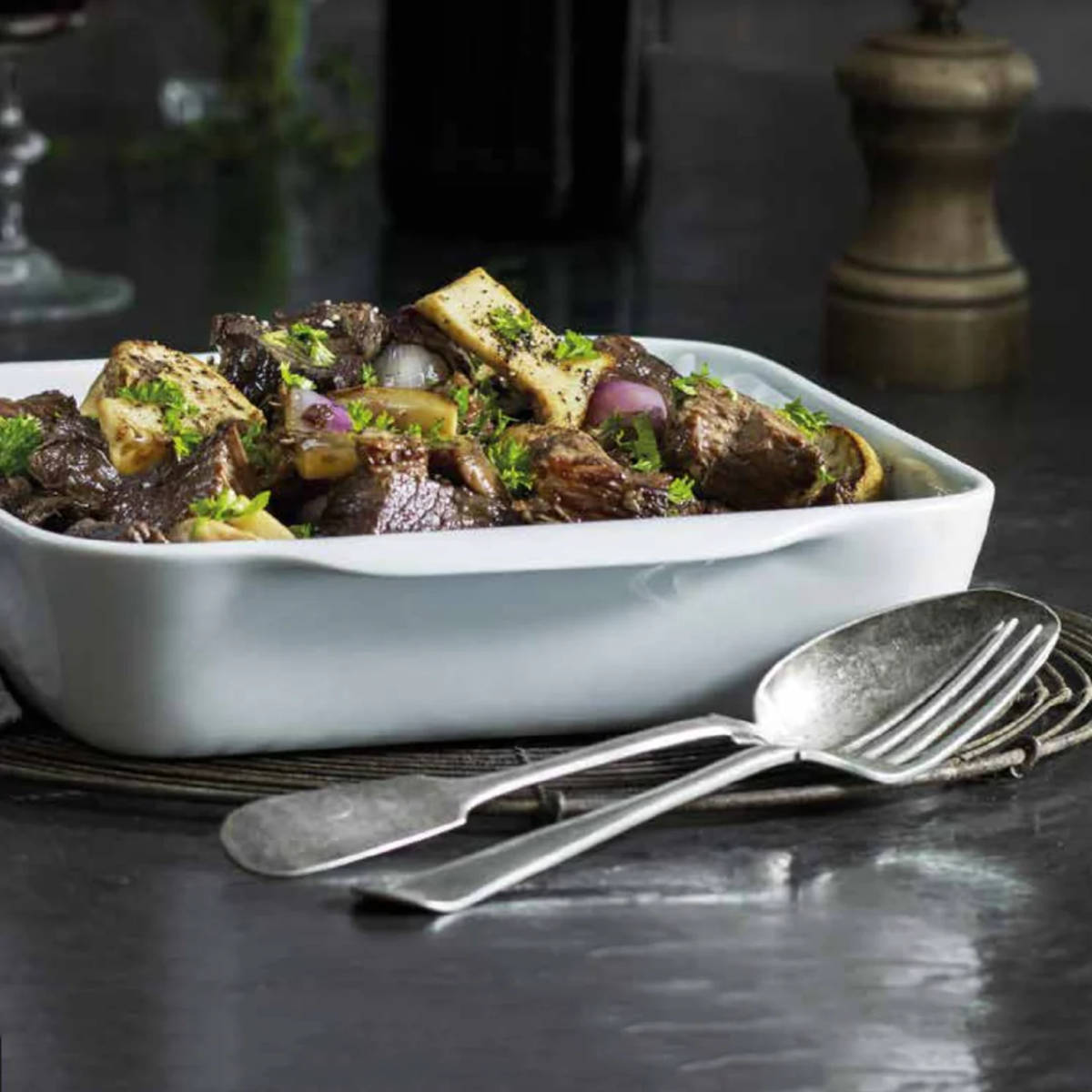 Pillivuyt Square Roasting Dish 22x26cm – in use serving beef stew with bone marrow, garnished with fresh herbs