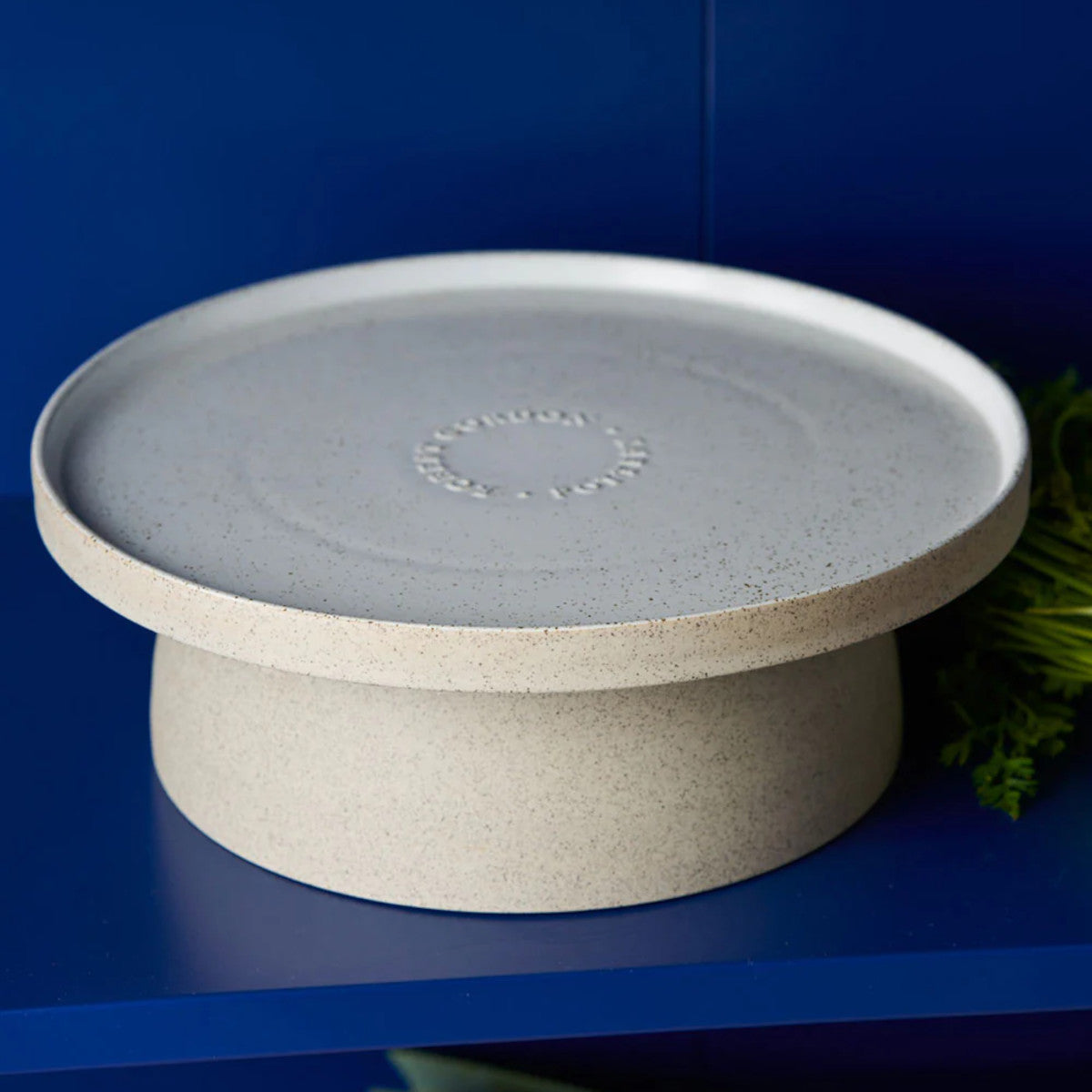 Royal Doulton Garden To Table Cake Stand White – styled view with subtle speckled finish on a deep blue background