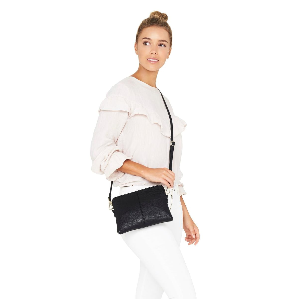 ELMS and KING Bowery Wallet Black Pebble | Minimax - with a woman