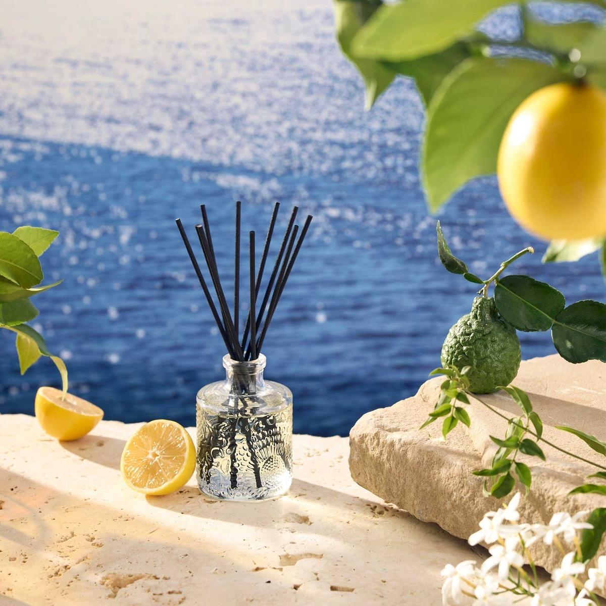 Voluspa Mediterranean Lemon Diffuser 100ml | Minimax - in a beach scene with lemons