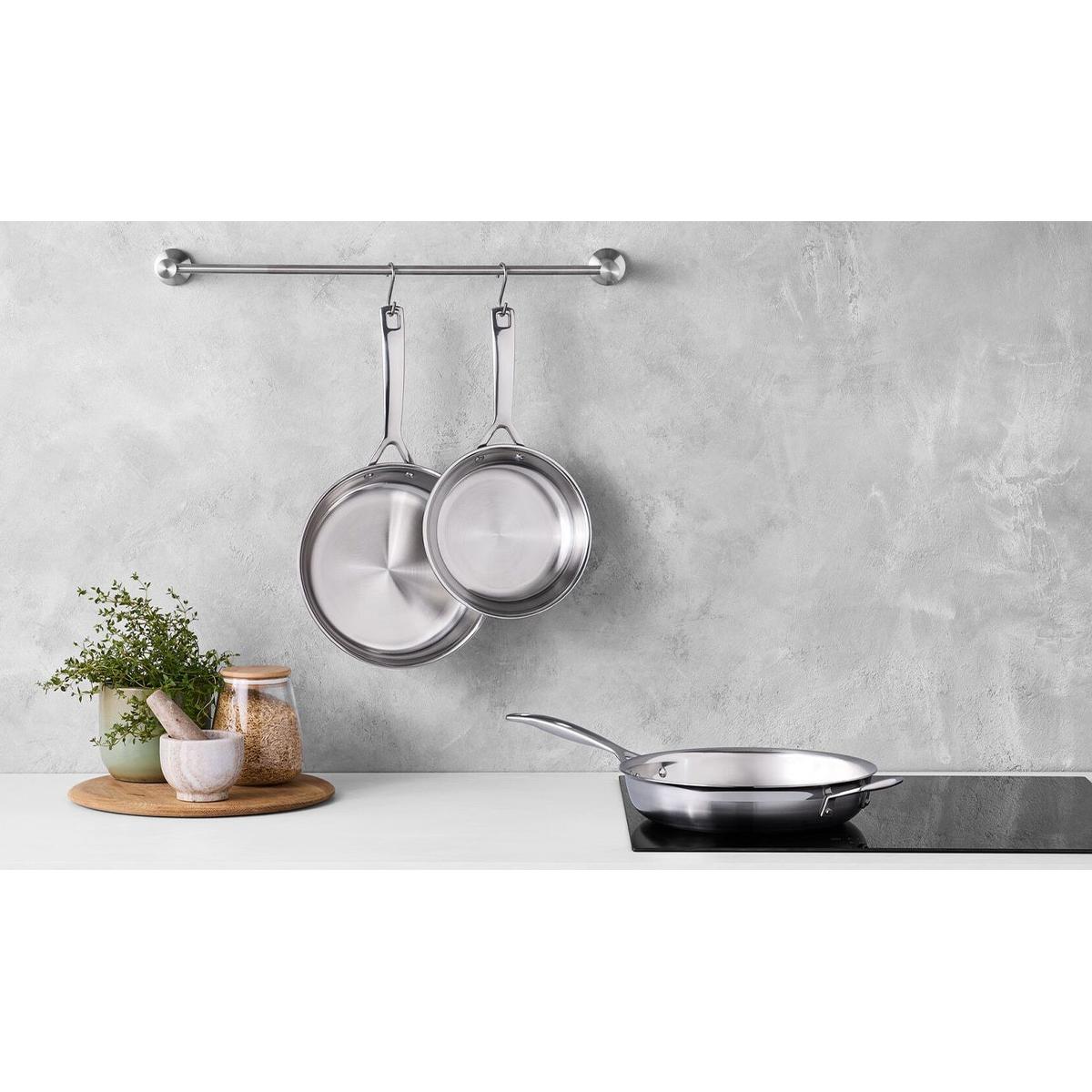 Le Creuset Classic 3-Ply Frypan Set 3 Piece | Minimax - on a kitchen counter with grey background