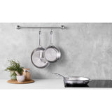 Le Creuset Classic 3-Ply Frypan Set 3 Piece | Minimax - on a kitchen counter with grey background
