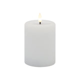 Pure Christmas LED Aura Ribbed Candle White 7.5x13cm – elegant flameless LED pillar candle with ribbed texture and warm glow design