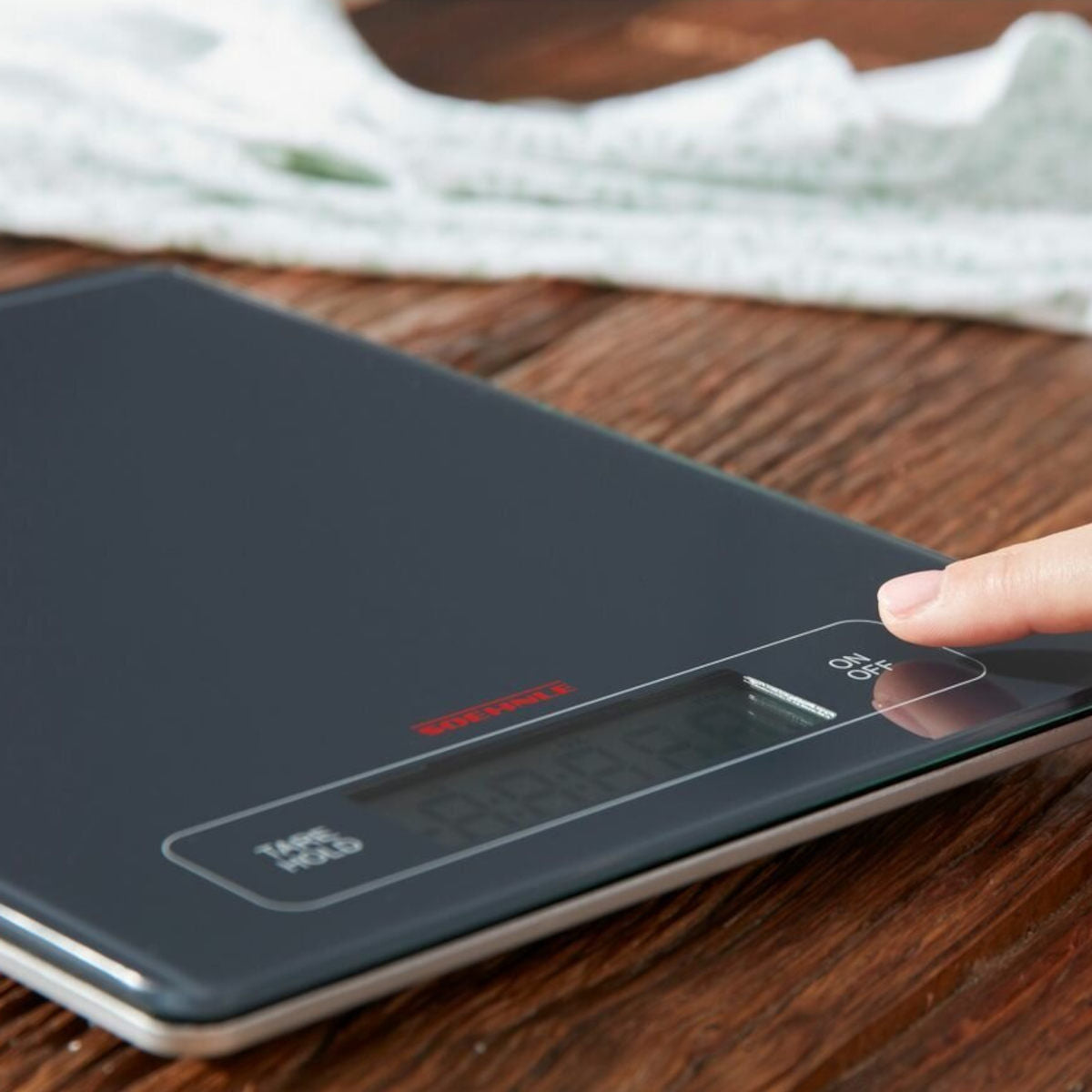 Soehnle Profi kitchen scale close-up, touch control buttons with tare function and digital display