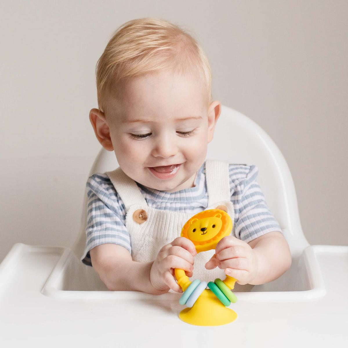 Tiger Tribe High Chair Buddy - Silicone Lion | Minimax - with a kid
