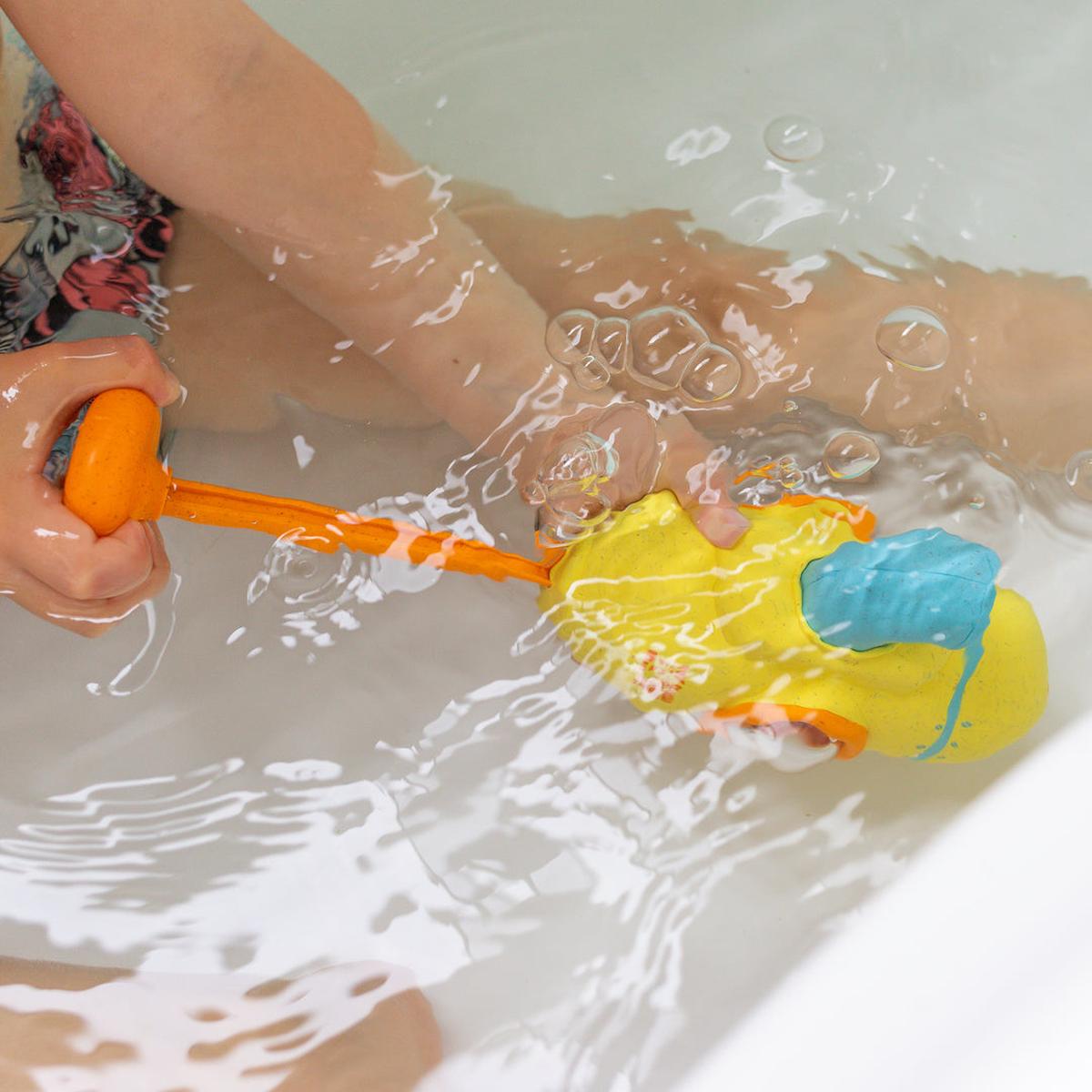 Tiger Tribe Tub Sub Bath Toy in yellow and blue with water-spraying submarine design