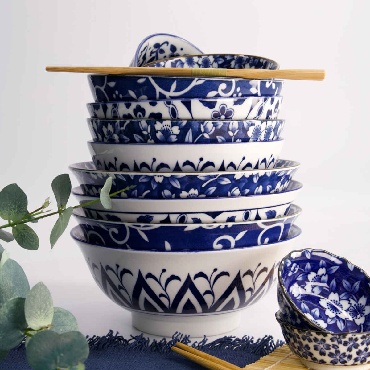 Tokyo Design Tokyo Blue Sakura Bowl Blue 21cm – stacked with other blue patterned bowls
