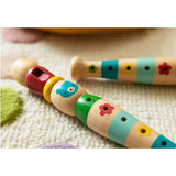 Petit Collage Playful Tunes Wooden Recorder 3x3x19cm featuring colourful animal and flower design