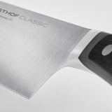Wusthof Classic 17 cm Santoku knife with precision stainless blade and black triple-riveted handle