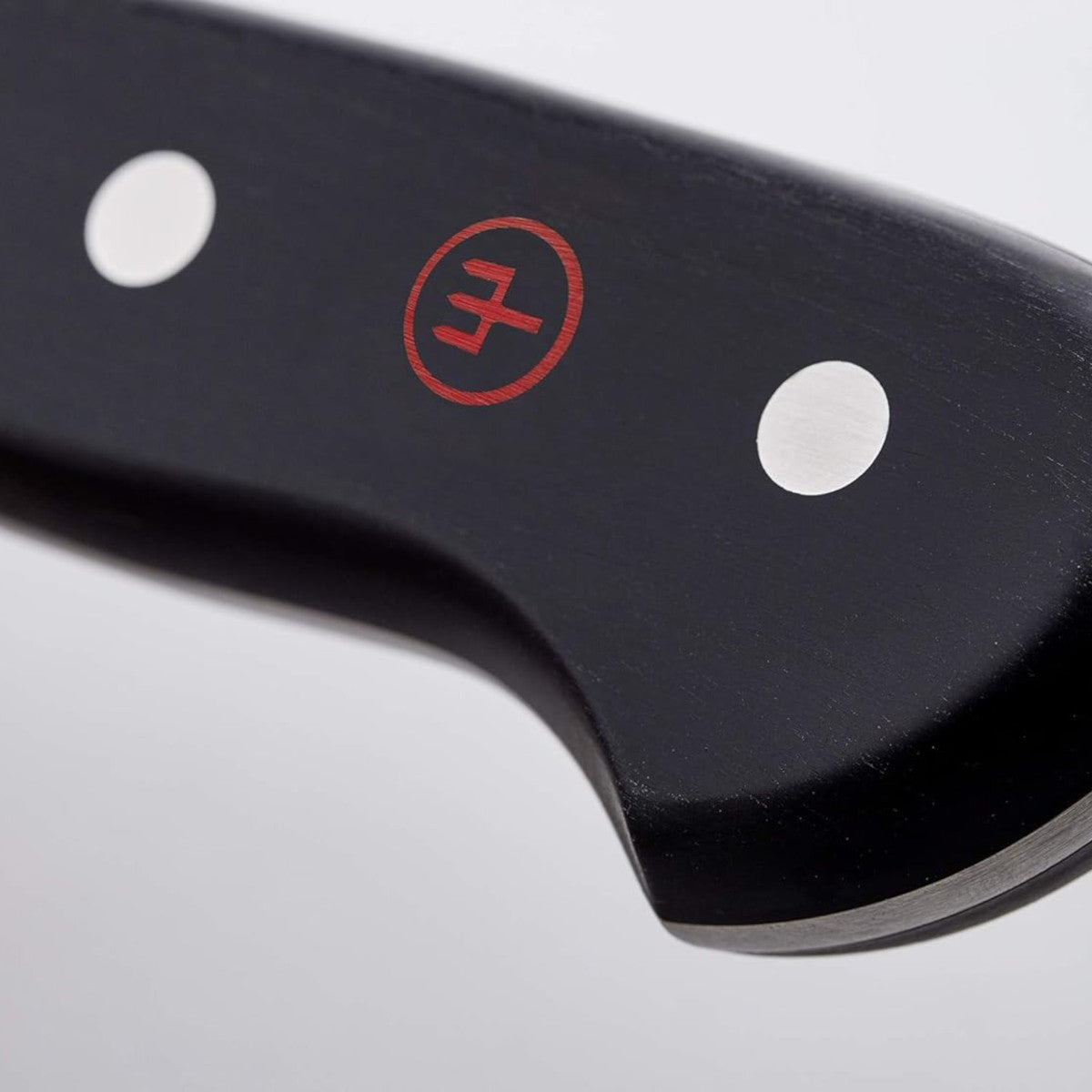 Wusthof Classic 17 cm Santoku knife with precision stainless blade and black triple-riveted handle