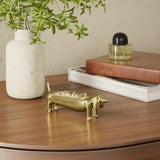 Umbra Dachsie Ring Holder Brass shaped like a dachshund with ridged tray along its back