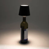 Maverick Rechargeable Bottle Lamp Black with black shade displayed on a blue ribbed bottle