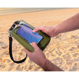 Maverick Dry Bag Green 2 Litres - with a hand holding in a beach| Minimax