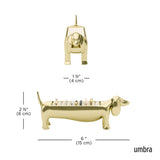 Umbra Dachsie Ring Holder Brass shaped like a dachshund with ridged tray along its back