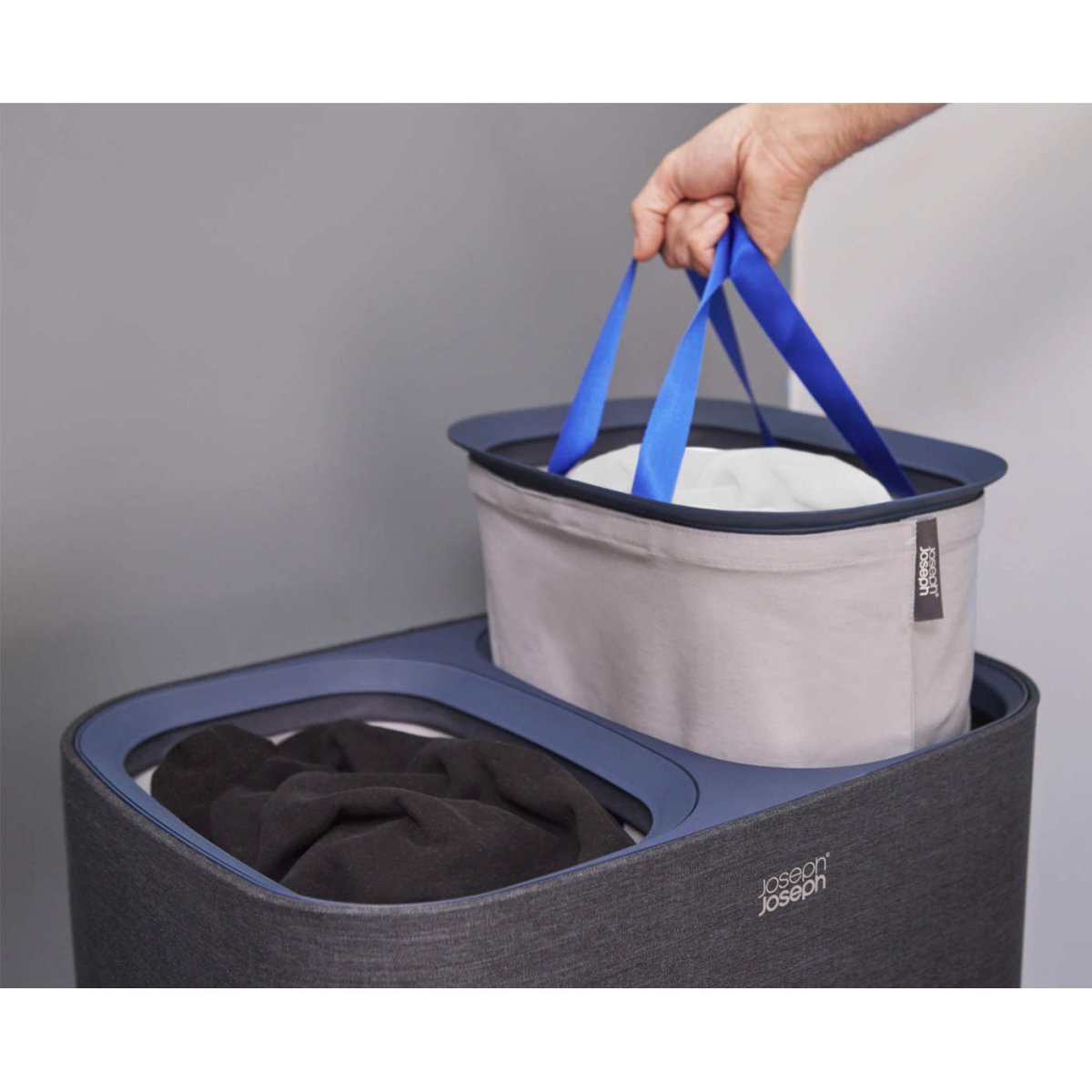 Joseph Joseph Tota laundry separation basket in black with dual compartments